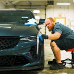 Premier team member applying a ceramic coating