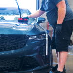 Professional applying ceramic coating